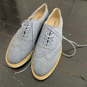Blue faux suede platform oxfords.